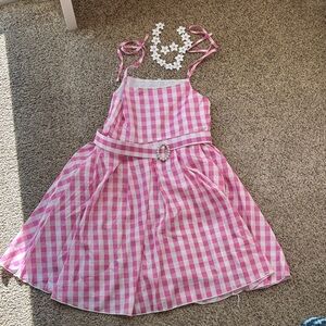 Barbie movie costume, dress, necklace and earrings. Size 140 which is a 9/10.